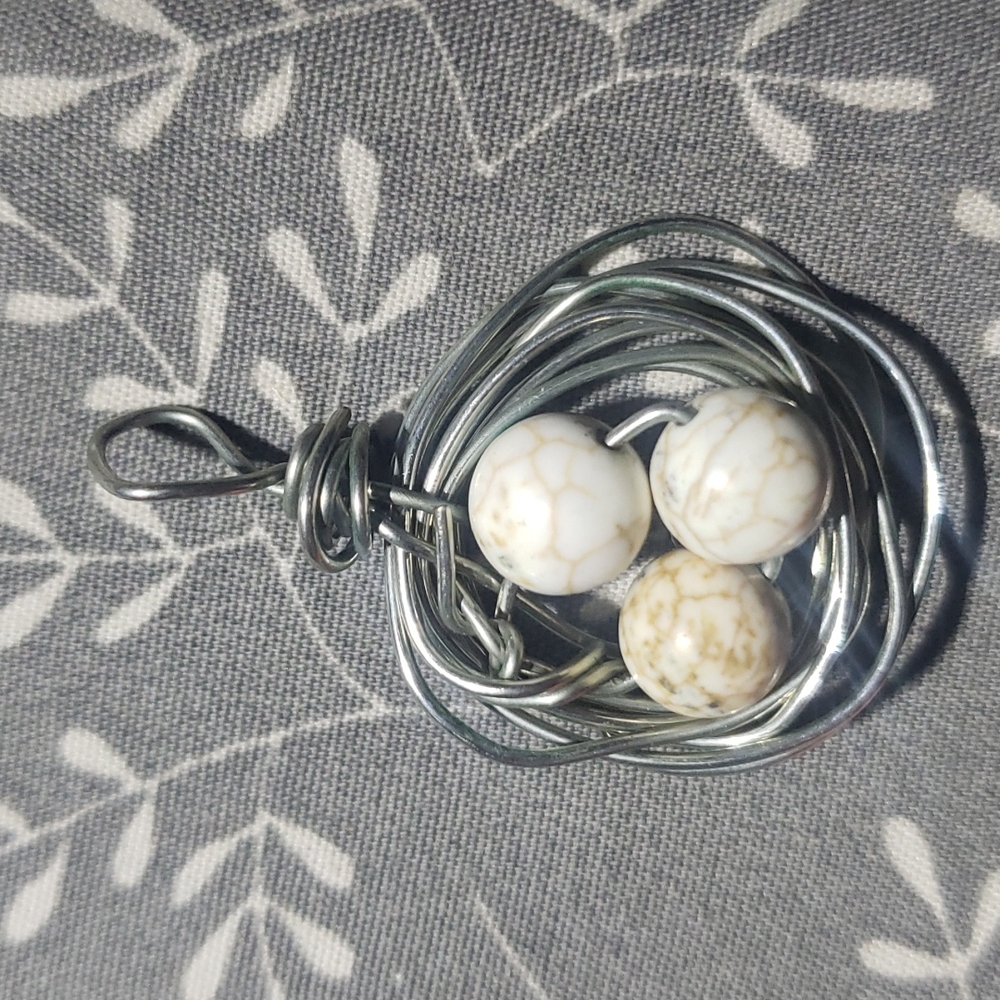4 for $15  Howlite stone stone birds nest pendent